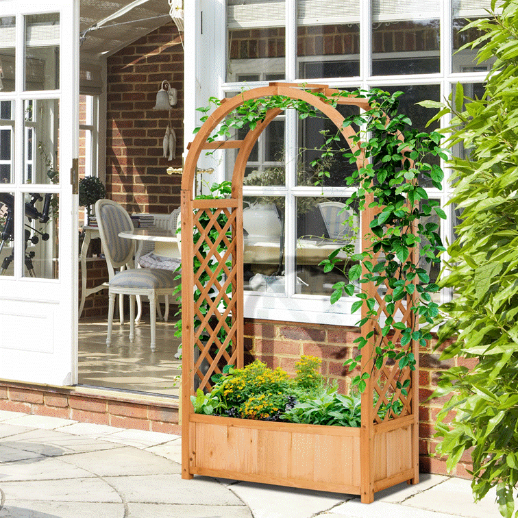 A wooden planter with plants in it

AI-generated content may be incorrect.